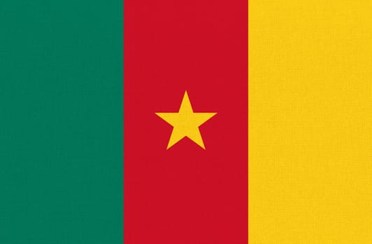 Flag of Cameroon. Cameroonian flag on fabric surface. Cameroonian national flag on textured background. Fabric Texture. Republic of Cameroon. African country
