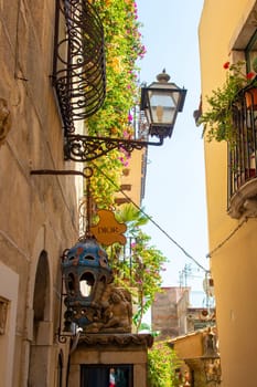 Taormina, Sicily, Italy - 28 September 2023. A side entrance of Dior in Vico Ascanio Marziani on the corner of Corso Umberto street.