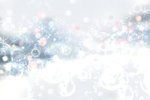 Abstract blurred festive light blue winter christmas or Happy New Year background with shiny blue and white bokeh lighted snowflakes and stars. Space for your design. Card concept.