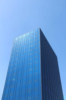 Modern beautiful skyscraper. Modern construction. Urban architecture. Buildings of big cities. Beautiful modern architecture of the building