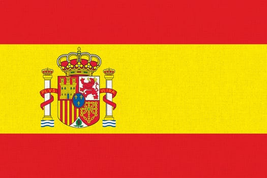 flag of Spain. National Spanish flag on fabric surface. Spanish national flag on textured background. Fabric Texture. Republic of Spain. European country. State symbol of Spain