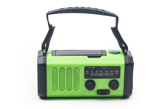 Emergency radio with flashlight rechargeable using built-in hand crank or solar cell