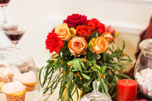 Floral decoration on festive table. floral arrangement in the design of a festive table