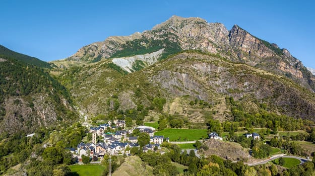 Erill la Vall panoramic aerial view mountains in the background, in the Vall de Boi, Lleida Catalonia Spain