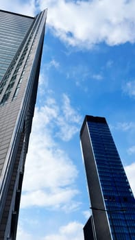 high skyscrapers on the background of the blue sky