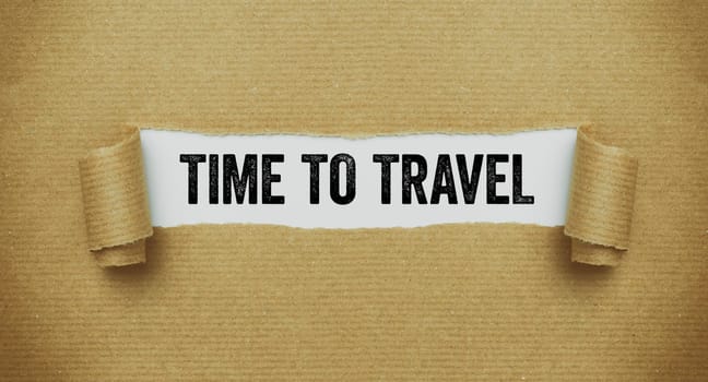 Torn paper revealing the words Time to travel
