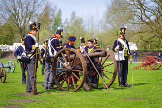 ALMELO, NETHERLANDS - APRIL 22, 2023: The Historical Festival Almelo is a reenactment event set in the French period (1795-1815). The focus is on the Battle of Ruigerode, a staged battle in Napoleonic style