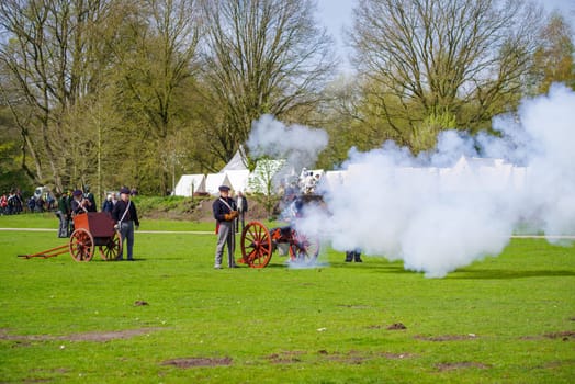 ALMELO, NETHERLANDS - APRIL 22, 2023: The Historical Festival Almelo is a reenactment event set in the French period (1795-1815). The focus is on the Battle of Ruigerode, a staged battle in Napoleonic style