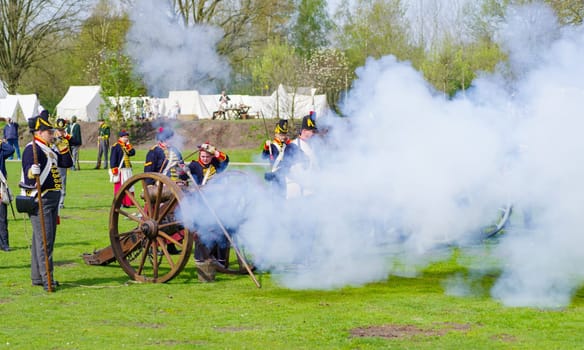ALMELO, NETHERLANDS - APRIL 22, 2023: The Historical Festival Almelo is a reenactment event set in the French period (1795-1815). The focus is on the Battle of Ruigerode, a staged battle in Napoleonic style