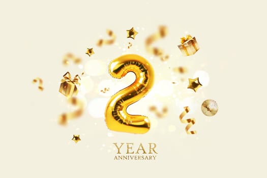 Gold festive balloons 2 year anniversary with golden confetti, presents, mirror ball and stars fly on a beige background with bokeh lights and sparks. Birthday luxury two card, a creative idea