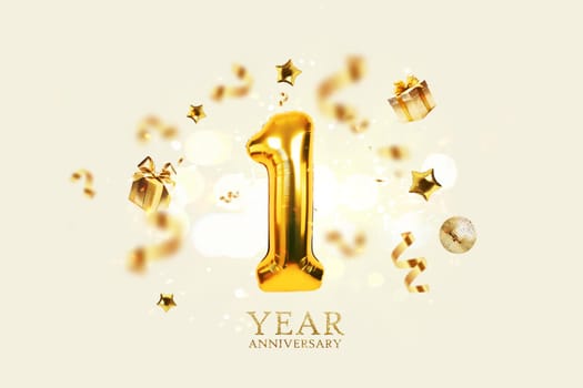 Gold festive balloons 1 year anniversary with golden confetti, presents, mirror ball and stars fly on a beige background with bokeh lights and sparks. Birthday luxury one card, a creative idea