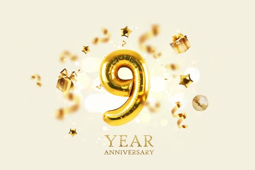 Gold festive balloons 9 year anniversary with golden confetti, presents, mirror ball and stars fly on a beige background with bokeh lights and sparks. Birthday luxury nine card, a creative idea