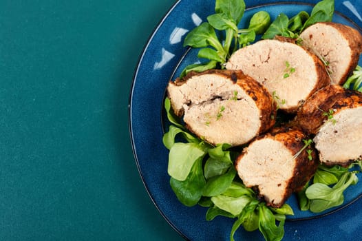 Roasted cod roe on a plate. Seafood and fish dishes.
