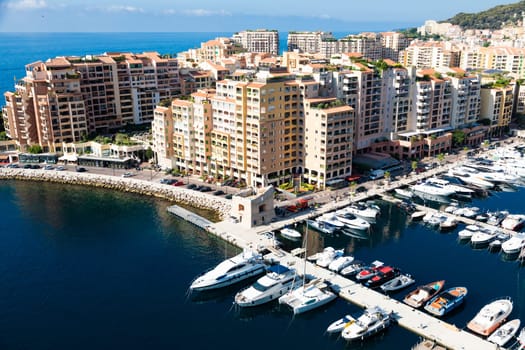 Montecarlo, Monaco - August 2022: panoramic view of the Fontvielle port with blue sky and sea