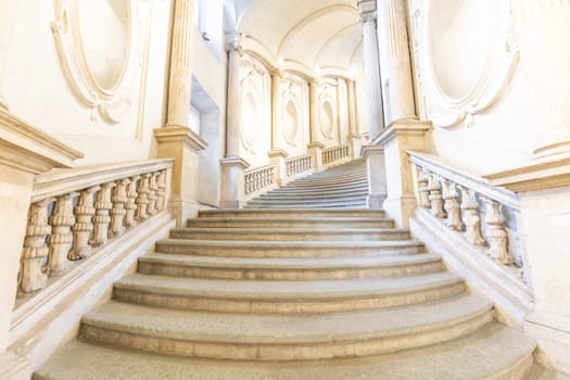Turin, Italy - Circa January 2022: luxury marble staircase. Antique architecture interior design