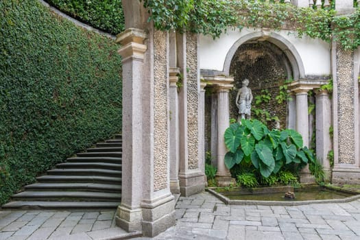 Old staircase in nature. Garden architecture design, green natural path with historic pavement