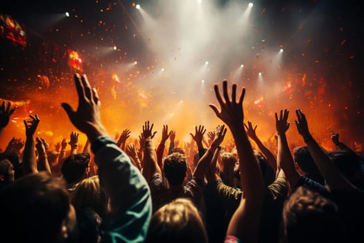 Crowd of people at a music concert or festival, colorful lights at the stage, audience cheering, live performance, rock show