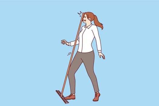 Business woman steps on rake and gets hit on head, demonstrating popular folk wisdom. Stupid girl manager gets injured walking on rake and not wanting to look at feet to avoid career failures