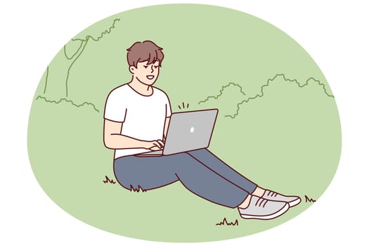 Smiling young man sit on ground in park working on laptop. Happy male freelance type on computer outdoors. Remote job or education. Vector illustration.