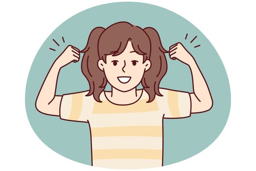 Small girl show muscles and strength