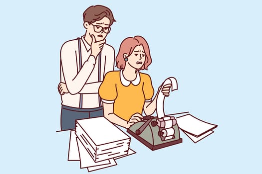 Retail business employees are changing cash tape into check issuing equipment, and are experiencing problems due to outdated cash machine. Man and woman doing financial audit in company