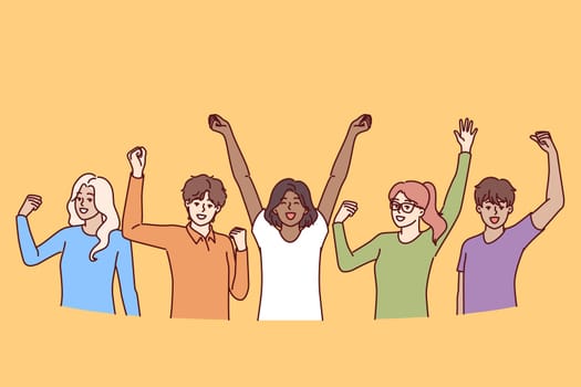 Cheerful diverse people raise hands up celebrating victory in joint educational project. Cheerful men and women in casual attire shouting for joy at arrival of good news to campus residents