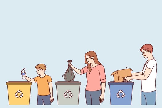 Parents and children stand near trash cans, participating in separate waste collection for helping to take care of environment. Boy and mom and dad are engaged in separate waste collection