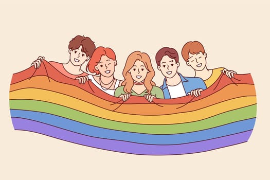 People with LGBT flag celebrating pride month or participating in gay and lesbian festival. Guys and girls wave LGBT flags calling on others to join queer community to fight for gender equality