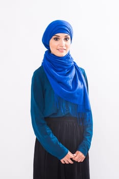beautiful asian muslim woman model posing on white background in studio.
