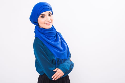 beautiful asian muslim woman model posing on white background in studio.