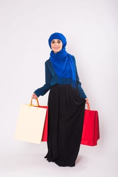 Arab Women with shopping bag in studio