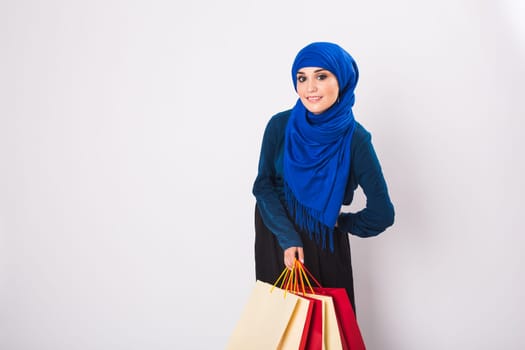Arab Women with shopping bag in studio