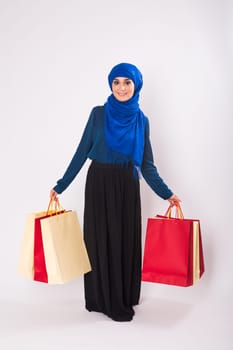 Arab Women with shopping bag in studio