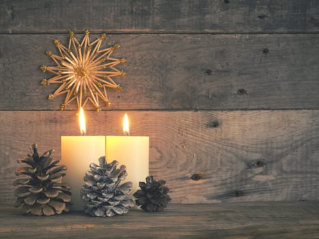 Two Advent candles are burning, the second Advent candle burns, Christmas concept