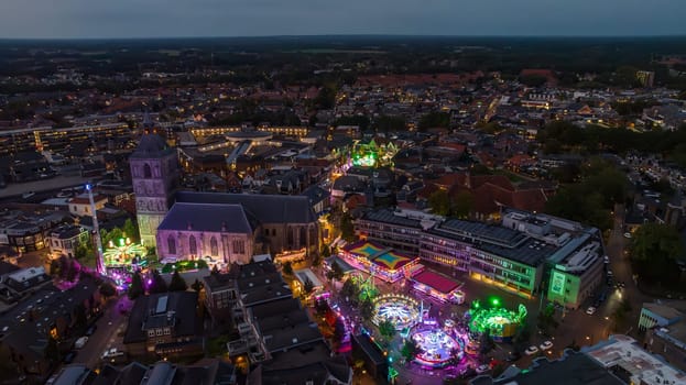 OLDENZAAL, NETHERLANDS - SEPTEMBER 30, 2023: Aerial evening view of the annual fair in the city center
