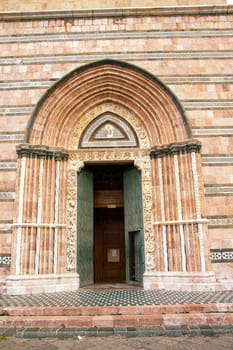 Sicily, Messina, Italy - 26 September 2023 – Messina Cathedral. Side entrance to Cathedral. The was consecrated in 1197 by Archbishop Berardo.