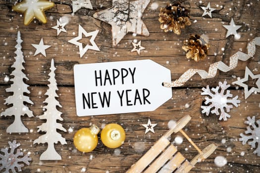 Rustic Wooden And Golden Christmas Background, Christmas Decor With Snowfall And Label With Text Happy New Year