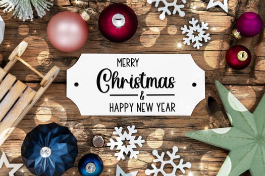 Colorful Christmas Decor With Bokeh, Christmas Balls And Snowflakes, With Sign With Text Merry Christmas And Happy New Year