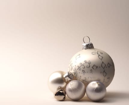 Four vintage Christmas balls on a bright background with space for text or image, seasonal holiday concept