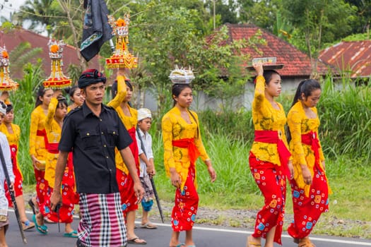 Bali, Indonesia: 17 August 2020: Royal cremation ceremony. Balinese hindus religion procession. Bade and Lembu Black Bull symbol of transportation for the spirit to the heaven
