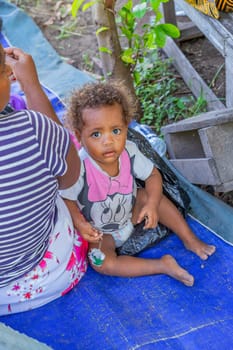 Viti Levu, Fiji: 29 May 2023: Small girl in her house in the village near Viti Levu Island, Fiji.