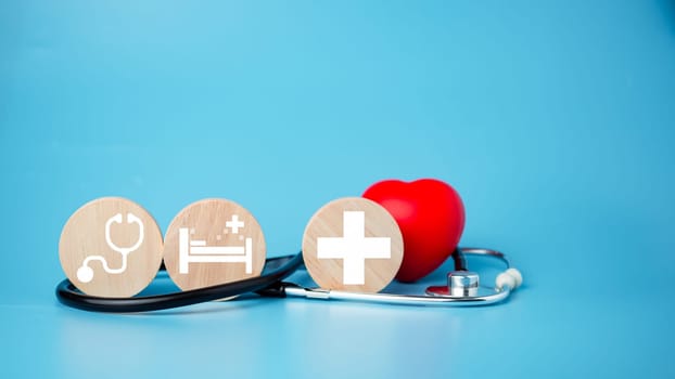 The concept of health insurance and medical welfare. Circle wood and red heart with icon. Health insurance and access to health care.