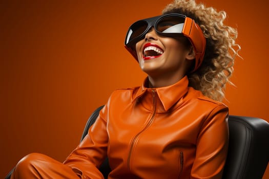 cheerful Beautiful model in an orange jacket and virtual glasses in a chair on a bright background