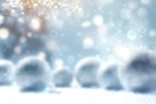 Abstract blurred festive light blue winter christmas or Happy New Year background with shiny blue and white bokeh lighted snowflakes and stars. Space for your design. Card concept.