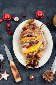 Homemade pork roll baked with aromatic mango pieces.
