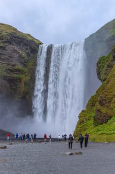 Skogar Iceland - July 28, 2023: Tourists visiting Skogafoss waterfall in south Iceland