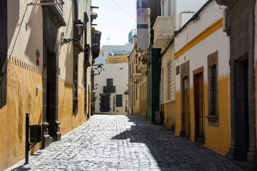Narrow street with old houses in the historic old town of Las Palmas on the Canary Island of Gran Canaria, Spain, Europe