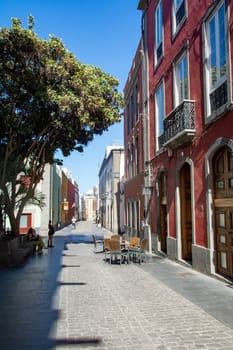 Narrow street with old houses in the historic old town of Las Palmas on the Canary Island of Gran Canaria, Spain, Europe