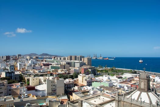 Panoramic view from above of the capital Las Palmas Gran Canaria in Spain with part of the Santa Ana Cathedral and views to the harbor and the sea