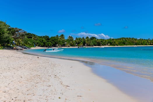 Nacula, Fiji: 26 May 2023: Tourist boats at the tropical sandy beach of Nacula island, Yasawa islands, Fiji, South Pacific Islands, Pacific